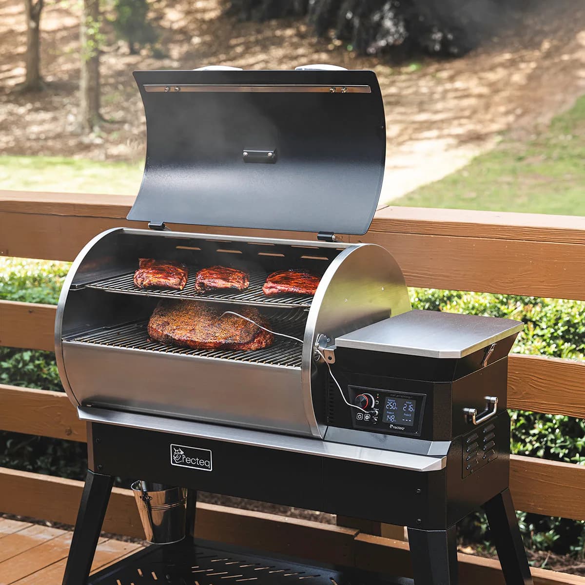 A rack of ribs on a Deck Boss 900 with the probe in