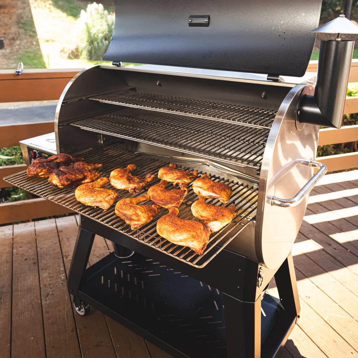 Chicken thighs on the pulled-out grates of a Flagship 1600