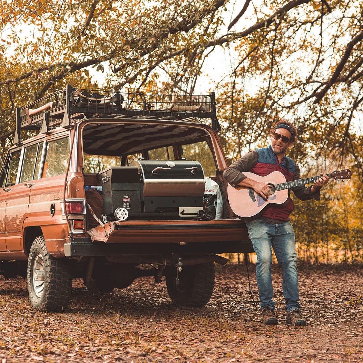A Road Warrior 340P beside a truck at a fall tailgate
